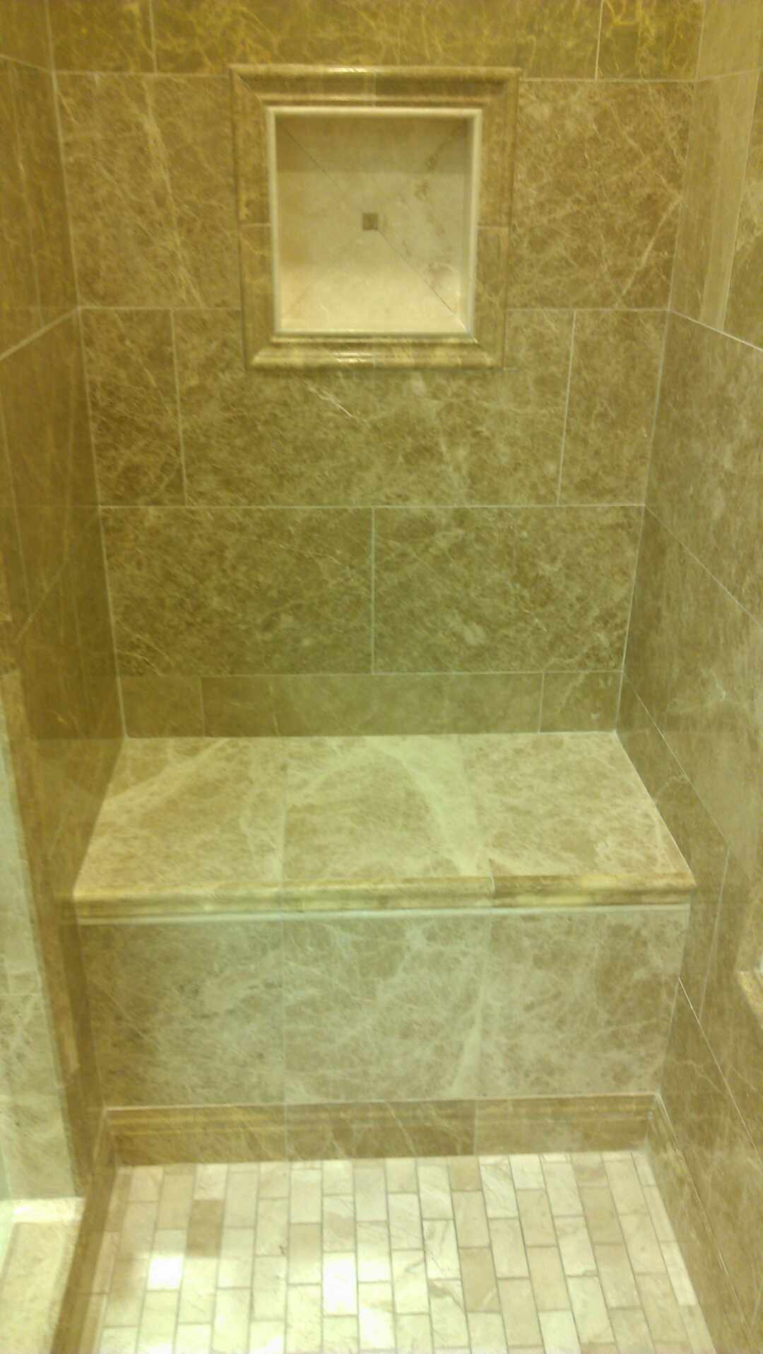 Travertine Shower with a Niche and a Travertine Bench